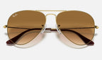 Ray-Ban RB3025 Aviator Large Metal Doré verres marron dégradés de face, branches fermées