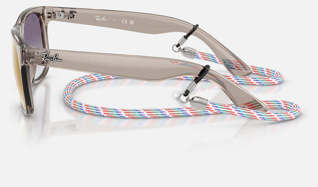 Ray-Ban RJ9069S Junior Justin Gris transparent de profil